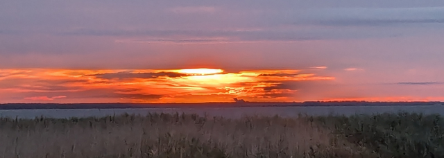 Radreise Baltikum Sonnenaufgang über der Bucht von Pärnu Estland